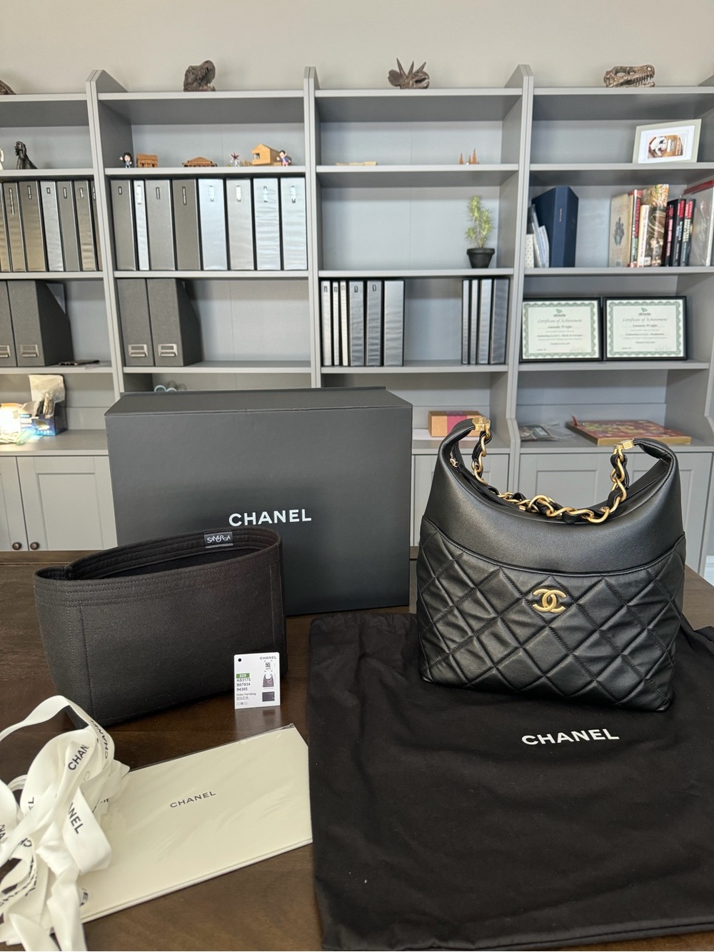 Chanel Hobo in black calfskin with gold hardware